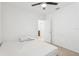 Bright bedroom featuring neutral walls, carpet flooring, and a ceiling fan for added comfort at 4324 Desert Rose, Kissimmee, FL 34746