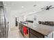 Spacious kitchen features granite countertops and stainless steel appliances with a breakfast bar at 4324 Desert Rose, Kissimmee, FL 34746