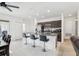 Bright kitchen features stainless steel appliances, granite countertops, and breakfast bar seating at 4324 Desert Rose, Kissimmee, FL 34746