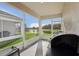 Screened patio with a view of a beautiful lake at 4324 Desert Rose, Kissimmee, FL 34746