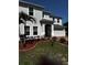 Well-maintained front yard featuring fresh mulch, lovely plants and green grass at 4804 Marcos Cir, Kissimmee, FL 34758