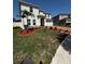 Well-maintained front yard featuring fresh mulch and beautiful landscaping at 4804 Marcos Cir, Kissimmee, FL 34758