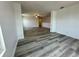 Spacious living area with stylish wood flooring and ample natural light, perfect for gatherings at 4804 Marcos Cir, Kissimmee, FL 34758