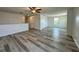A loft with stylish wood flooring and lots of natural light, perfect for relaxing and entertaining at 4804 Marcos Cir, Kissimmee, FL 34758