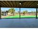 Covered patio providing a shady retreat with ceiling fans overlooking a spacious backyard at 4804 Marcos Cir, Kissimmee, FL 34758