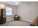 Loft bedroom with neutral carpet, natural light and accent chair at 483 Stillwater Dr, Oviedo, FL 32765