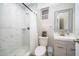 Clean bathroom featuring shower, toilet, vanity with sink, and a mirror at 502 Engel Dr, Orlando, FL 32807