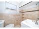 Cozy bathroom featuring neutral tile backsplash, and ample natural light at 502 Engel Dr, Orlando, FL 32807