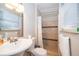 Bathroom featuring tiled shower with glass doors and modern fixtures at 502 Engel Dr, Orlando, FL 32807