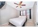 Bright bedroom with tile floors, simple decor, and ample natural light at 502 Engel Dr, Orlando, FL 32807
