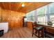 Kitchen features a wooden ceiling, wood paneling, and laminate flooring at 502 Engel Dr, Orlando, FL 32807