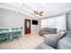 Cozy living room area with comfortable seating, adjacent to a dining space at 502 Engel Dr, Orlando, FL 32807