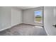 Bedroom showcasing ample natural light through the window and a convenient closet space at 502 Viceroy Ct, Kissimmee, FL 34758