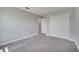Cozy bedroom features neutral tones and a spacious closet, ready for your personal touch at 502 Viceroy Ct, Kissimmee, FL 34758