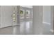 Bright entryway with tile flooring leading to an open-concept living space and sunlit rooms at 502 Viceroy Ct, Kissimmee, FL 34758