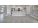 Modern kitchen featuring stainless steel appliances, white cabinets, and a granite countertop island at 502 Viceroy Ct, Kissimmee, FL 34758