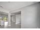 Bright living room with modern finishes, neutral walls, and tile floors at 502 Viceroy Ct, Kissimmee, FL 34758