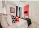 Bright bedroom featuring a twin bed, racing decor, and cheerful Disney Cars themed pillows at 520 Prestwick Dr, Davenport, FL 33897