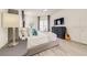 Spacious bedroom features a plush bed, modern furniture, decor, and a sliding glass door at 520 Prestwick Dr, Davenport, FL 33897