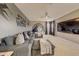 Spacious living room featuring comfortable seating, large TV, and Star Wars themed wall decor at 520 Prestwick Dr, Davenport, FL 33897