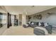 Spacious living room featuring comfortable seating, large TV, and Star Wars themed wall decor at 520 Prestwick Dr, Davenport, FL 33897