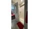 Bathroom featuring a glass-enclosed shower with white tiling and neutral accents at 5306 Meadow Song Dr, Okahumpka, FL 34762