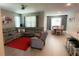 Open-concept living room and dining area features recessed lighting and modern decor at 5306 Meadow Song Dr, Okahumpka, FL 34762