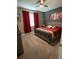 Well-lit main bedroom with a neutral color scheme and comfortable furnishings at 5306 Meadow Song Dr, Okahumpka, FL 34762