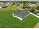 An aerial view showcases this home's layout, backyard and surrounding landscape at 563 Viceroy Ct, Kissimmee, FL 34758