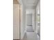 Hallway showcasing connections to various rooms within the home, highlighting the open floor plan at 563 Viceroy Ct, Kissimmee, FL 34758