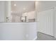Kitchen with breakfast bar with granite countertops and white cabinets at 563 Viceroy Ct, Kissimmee, FL 34758