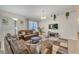 Comfortable living room with plush sofas, neutral tones, tv, and inviting ambiance at 620 Old Bridge Cir, Davenport, FL 33897