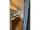 Bathroom featuring dual vanities, a tub, and a separate shower at 6480 Fall St, St Cloud, FL 34771