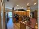 Well-lit kitchen featuring stainless steel appliances and an open design at 6480 Fall St, St Cloud, FL 34771