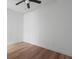 This bedroom features hardwood floors, neutral paint and a window providing lots of natural light at 650 Main St, Altamonte Springs, FL 32701