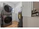 Convenient laundry room featuring a stacked washer and dryer and utility hookups at 650 Main St, Altamonte Springs, FL 32701