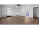 Spacious room featuring hardwood floors, neutral paint and doorways to other rooms at 650 Main St, Altamonte Springs, FL 32701