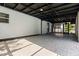 Spacious screened-in patio featuring brick flooring, a ceiling fan, and natural light at 650 Main St, Altamonte Springs, FL 32701