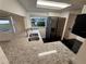 Kitchen features granite countertops, stainless steel appliances, and updated cabinets at 709 Orchid Dr, Davenport, FL 33897