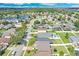 Aerial view of homes in a Gathering-friendly neighborhood with lush landscaping at 721 Hardwood Cir, Orlando, FL 32828