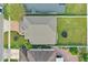 Aerial view of a single Gathering home with well-maintained lawn and mature trees at 721 Hardwood Cir, Orlando, FL 32828