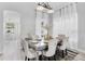 Elegant dining area featuring stylish seating and modern lighting at 721 Hardwood Cir, Orlando, FL 32828