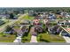 Neighborhood aerial view highlighting a home with nearby homes and street access at 802 Massy Ct, Kissimmee, FL 34759