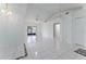 Spacious living room featuring tile flooring, ceiling fans, and a sliding glass door at 802 Massy Ct, Kissimmee, FL 34759