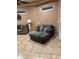 Comfortable living room with tile floors, cozy seating, and a decorative fireplace at 878 Elgin Dr, Winter Springs, FL 32708
