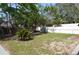 Spacious backyard featuring a mix of grass and shade trees at 894 Superior St, Deltona, FL 32725
