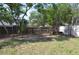 Expansive backyard with mature trees and partial fencing at 894 Superior St, Deltona, FL 32725