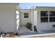 Covered entry way with a manicured garden at 894 Superior St, Deltona, FL 32725