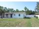 Charming single-story home featuring a well-maintained lawn and a secure fenced yard at 894 Superior St, Deltona, FL 32725