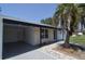 Home front exterior featuring a stone facade and a carport at 894 Superior St, Deltona, FL 32725
